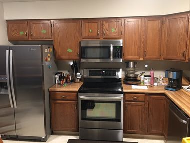 Before & After Cabinet Painting in Coatesville PA
(Carbon Black Painted Cabinets with New Hardware) (1)